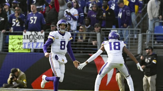 Nov 7, 2021; Baltimore, Maryland, USA; Minnesota Vikings quarterback Kirk Cousins (8) celebrates with wide receiver Justin Jefferson (18) after scoring a second quarter touchdown against the Baltimore Ravens at M&T Bank Stadium.